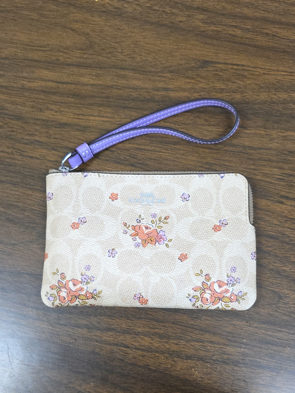 COACH FLORAL WRISTLET NO HANGTAG